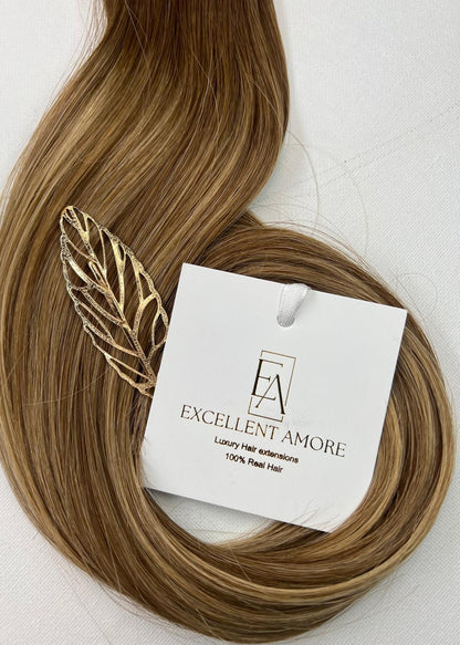 Serena hair extension van Excellent Amore kleur goud blond