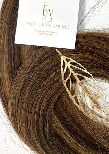 Close up van Aurabell hair extension van Excellent Amore kleur bruin baleyage